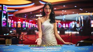 Mobile phone showing jt togel Book of Dead slot game with spinning reels and Egyptian symbols
